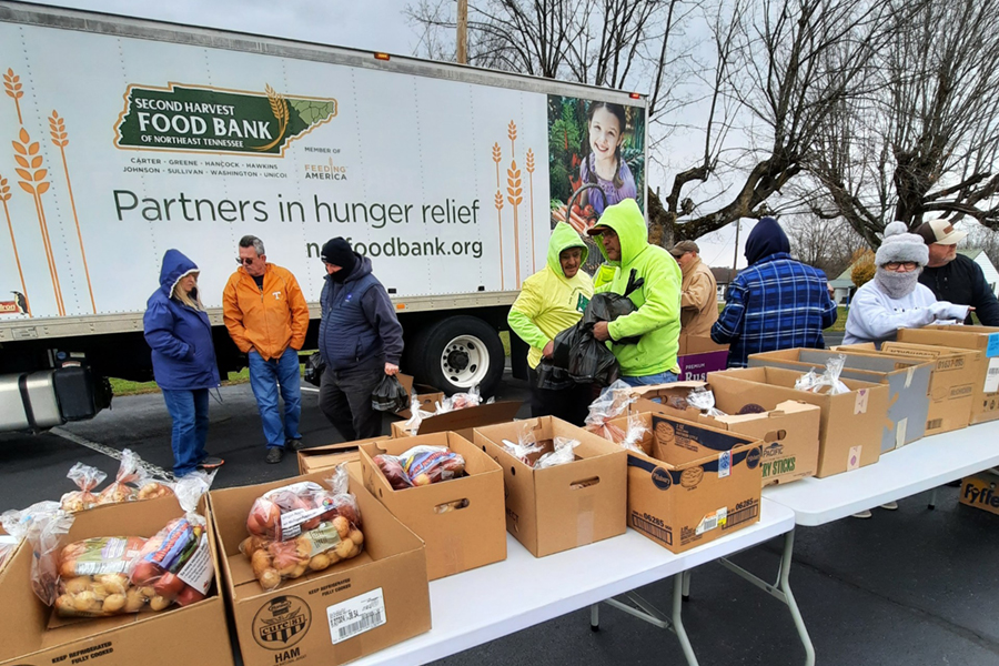 Profile employees volunteering at Second HarvestFood Bank